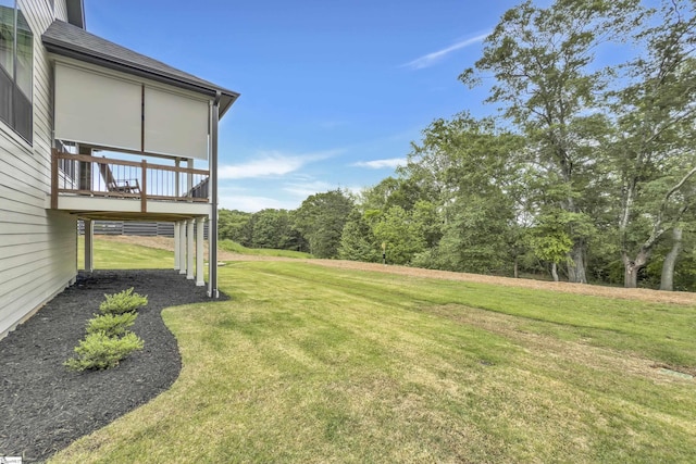 view of yard with a deck