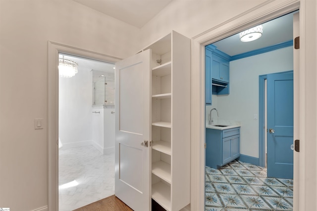 full bathroom featuring baseboards and vanity