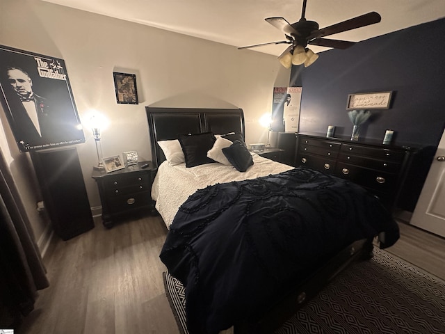 bedroom featuring ceiling fan and wood finished floors