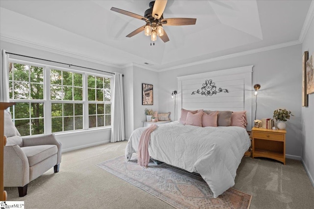 bedroom with carpet floors, a ceiling fan, baseboards, and a raised ceiling