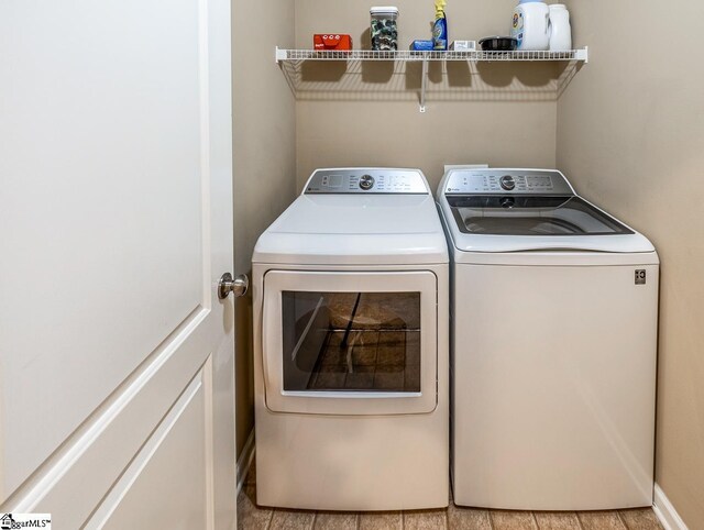 laundry area featuring laundry area and washing machine and clothes dryer