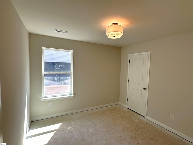 317 W Hampton St, Anderson, SC 29624 - empty room with baseboards and visible vents