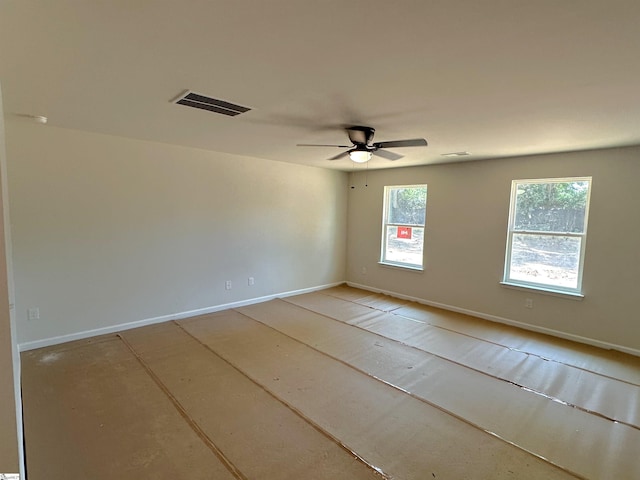 317 W Hampton St, Anderson, SC 29624 - empty room with ceiling fan and baseboards