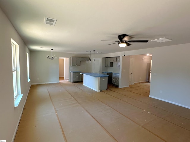 317 W Hampton St, Anderson, SC 29624 - kitchen with baseboards, ceiling fan with notable chandelier, and a kitchen island