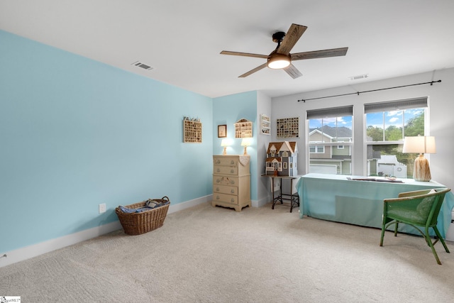 interior space with baseboards, visible vents, and carpet