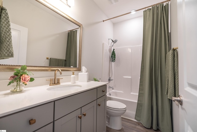 429 Rubia Dr, Greenville, SC 29607 - full bathroom with vanity, visible vents, wood finished floors, toilet, and shower / bath combo