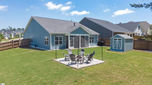 429 Rubia Dr, Greenville, SC 29607 - rear view of house with a storage shed, a sunroom, a patio area, a fenced backyard, and a yard