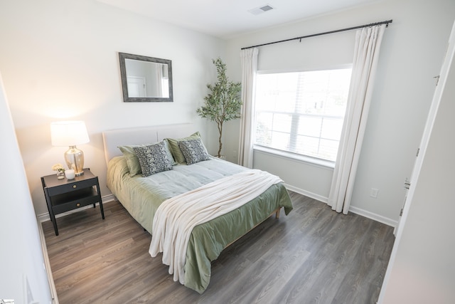429 Rubia Dr, Greenville, SC 29607 - bedroom with baseboards, visible vents, and wood finished floors