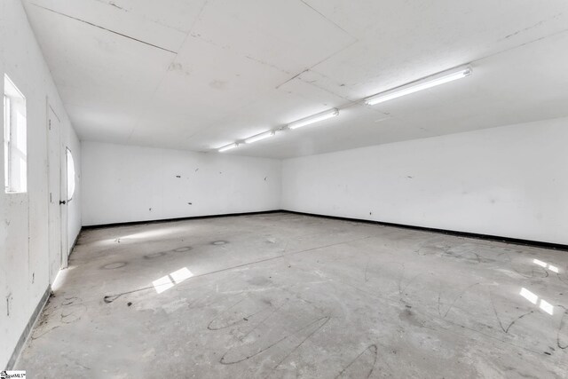 garage with baseboards