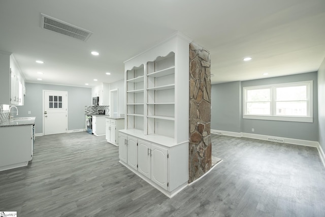 interior space with visible vents, recessed lighting, and dark wood-style flooring