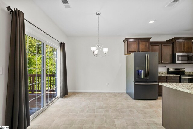 kitchen with dark brown cabinetry, visible vents, light stone counters, a chandelier, and stainless steel appliances