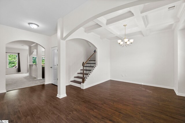 interior space featuring stairs, baseboards, dark wood-style floors, and beam ceiling