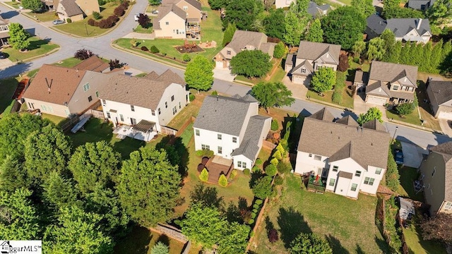 birds eye view of property with a residential view
