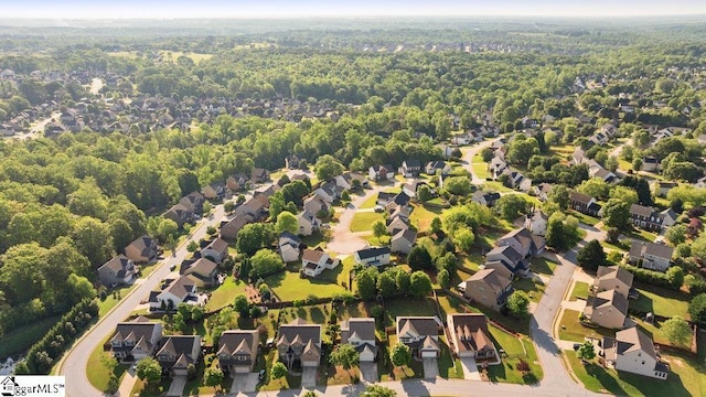 aerial view with a forest view and a residential view