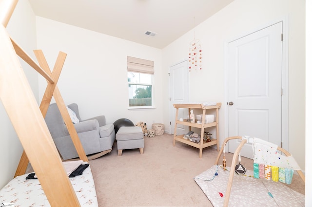 game room with carpet floors and visible vents