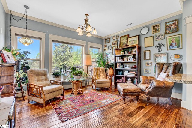 129 Eliza Ln, Marietta, SC 29661 - sitting room with crown molding, a chandelier, visible vents, and hardwood / wood-style floors