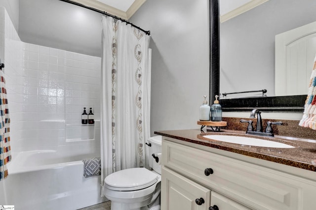 full bathroom with vanity, shower / bath combo with shower curtain, and toilet