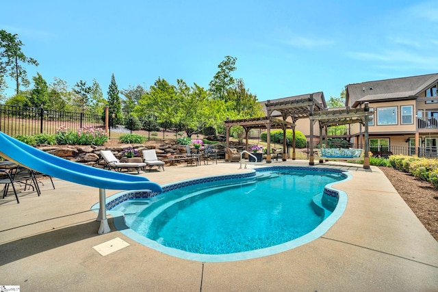 view of pool featuring fence, a fenced in pool, a water slide, and a pergola