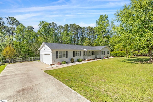 ranch-style house featuring a garage, fence, a front yard, concrete driveway, and a porch