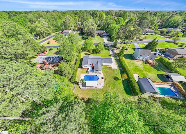 aerial view with a view of trees and a residential view