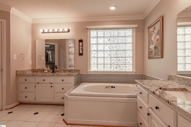 104 Bellewood Dr, Easley, SC 29640 - full bathroom featuring crown molding, a bath, tile patterned floors, two vanities, and a sink