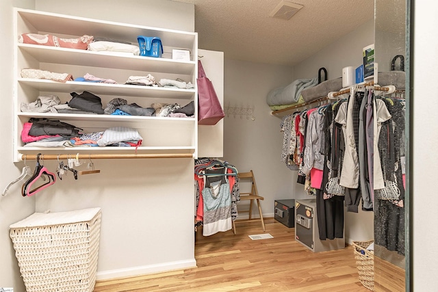 104 Bellewood Dr, Easley, SC 29640 - walk in closet featuring visible vents and wood finished floors