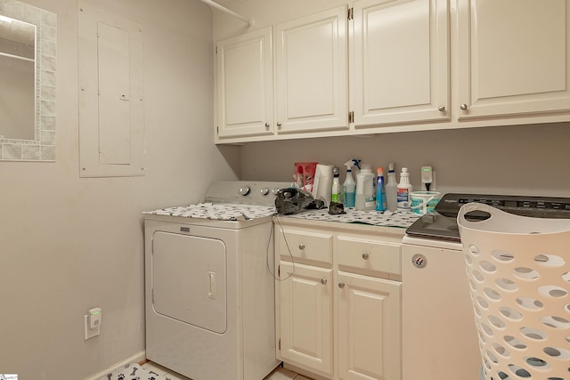 104 Bellewood Dr, Easley, SC 29640 - laundry area featuring electric panel, cabinet space, and washer and dryer