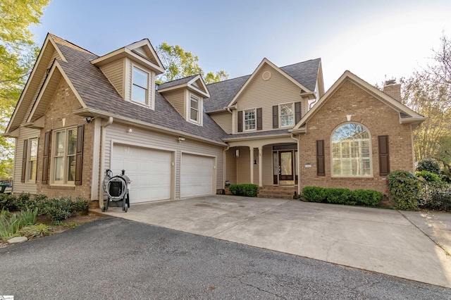 104 Bellewood Dr, Easley, SC 29640 - view of front of home with brick siding, aphalt driveway, roof with shingles, and a chimney
