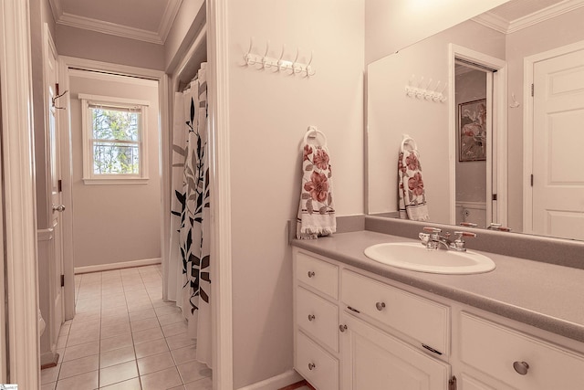 104 Bellewood Dr, Easley, SC 29640 - bathroom featuring crown molding, vanity, tile patterned flooring, and baseboards