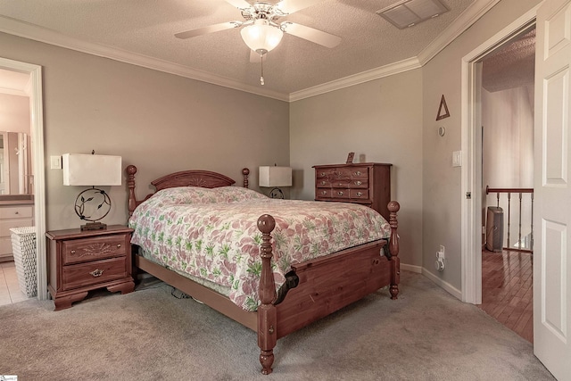 104 Bellewood Dr, Easley, SC 29640 - carpeted bedroom with ensuite bath, a textured ceiling, a ceiling fan, visible vents, and ornamental molding