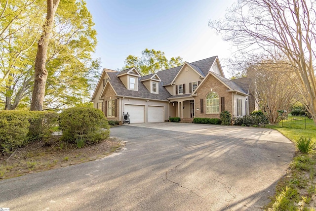 104 Bellewood Dr, Easley, SC 29640 - view of front of home with a shingled roof, aphalt driveway, and brick siding