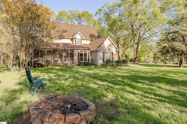 104 Bellewood Dr, Easley, SC 29640 - exterior space with a sunroom, an outdoor fire pit, and a front yard