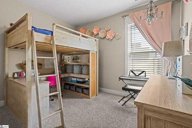 bedroom with carpet flooring and baseboards