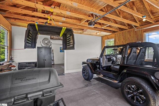 garage featuring baseboards