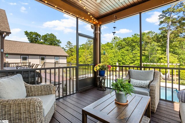 deck with an outdoor pool