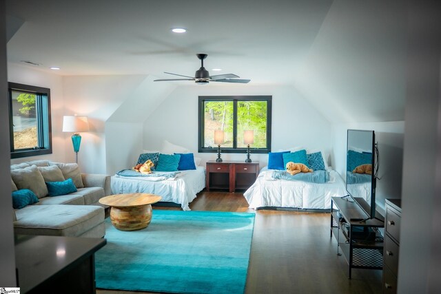 bedroom with recessed lighting, a ceiling fan, lofted ceiling, and wood finished floors