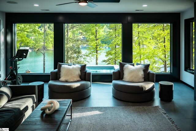 sunroom / solarium featuring a jacuzzi