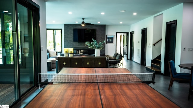 dining room with stairs, a ceiling fan, and recessed lighting