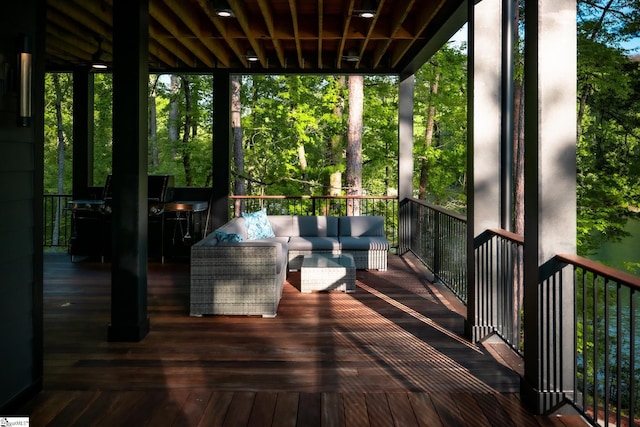 wooden deck featuring an outdoor living space