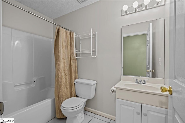 full bathroom featuring vanity, shower / bath combo with shower curtain, toilet, a textured ceiling, and tile patterned floors