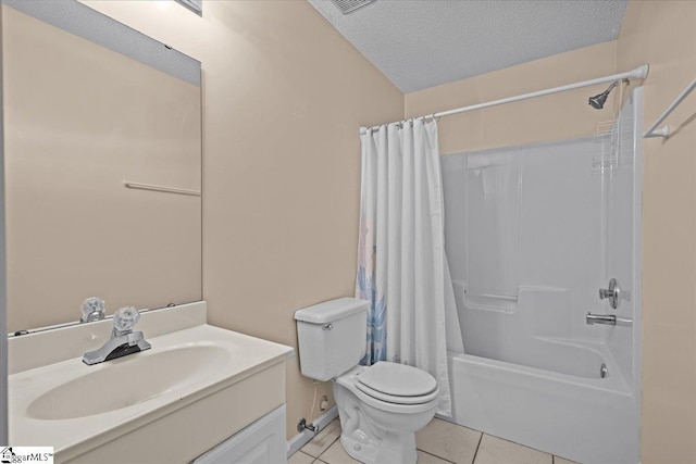 full bathroom featuring vanity, toilet, a textured ceiling, tile patterned floors, and shower / bath combo