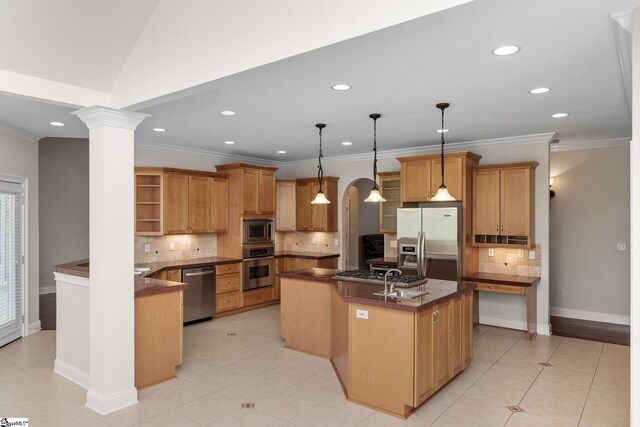 kitchen featuring appliances with stainless steel finishes, open shelves, a center island with sink, and recessed lighting
