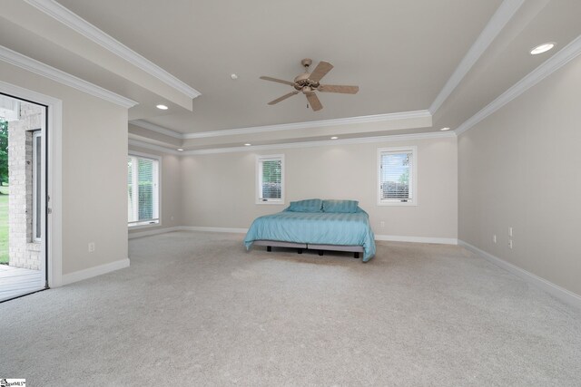 carpeted bedroom with crown molding, access to outside, a raised ceiling, recessed lighting, and baseboards