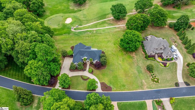 drone / aerial view featuring view of golf course