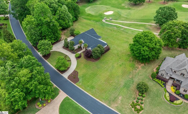 birds eye view of property featuring golf course view