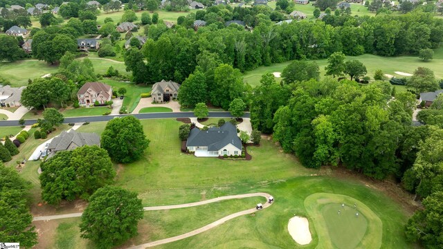 birds eye view of property with a residential view and golf course view