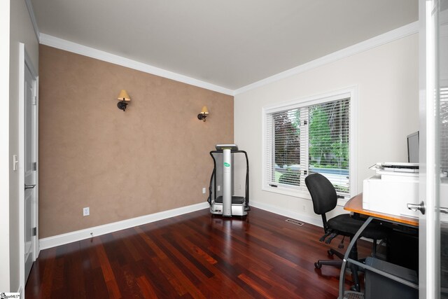 office area with baseboards, ornamental molding, and wood finished floors