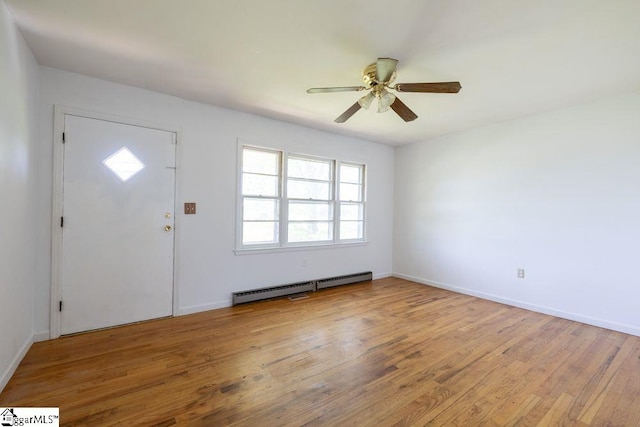 2403 Dobbins Bridge Rd, Anderson, SC 29626 - foyer featuring baseboards, a baseboard radiator, ceiling fan, and wood finished floors
