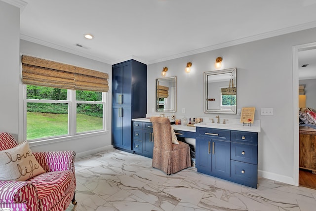 bathroom with crown molding, baseboards, and marble finish floor