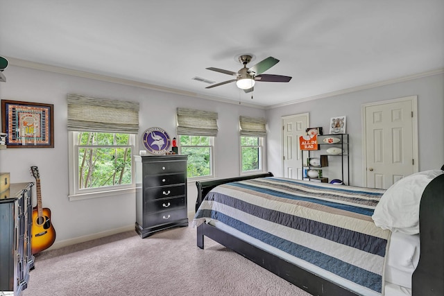 bedroom with carpet floors, visible vents, and ornamental molding